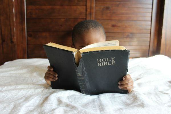 A child learning the faith
